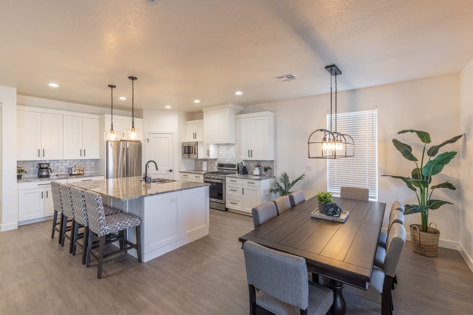 View of Dining Room - With an open and spacious floor plan, the Dining Room and Kitchen can accommodate meal preparations for groups large or small.