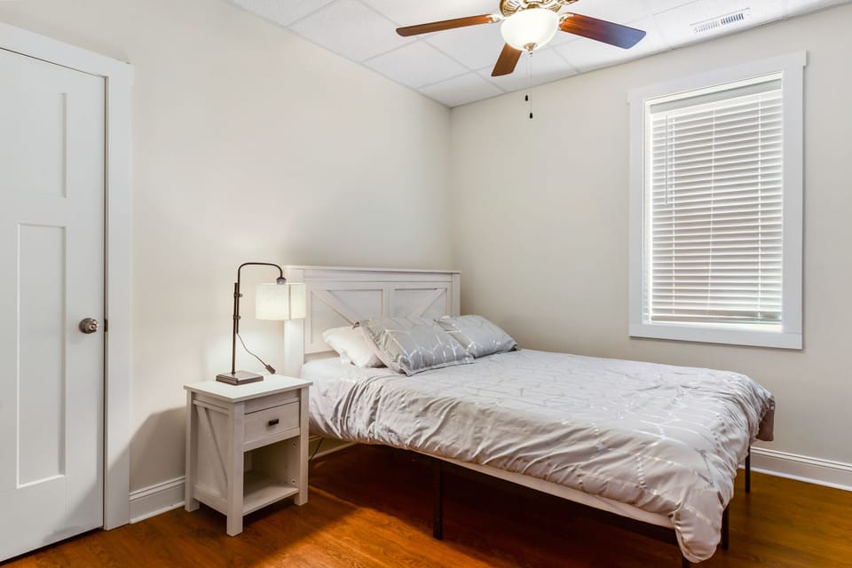 Queen sized bed, dresser, closet.