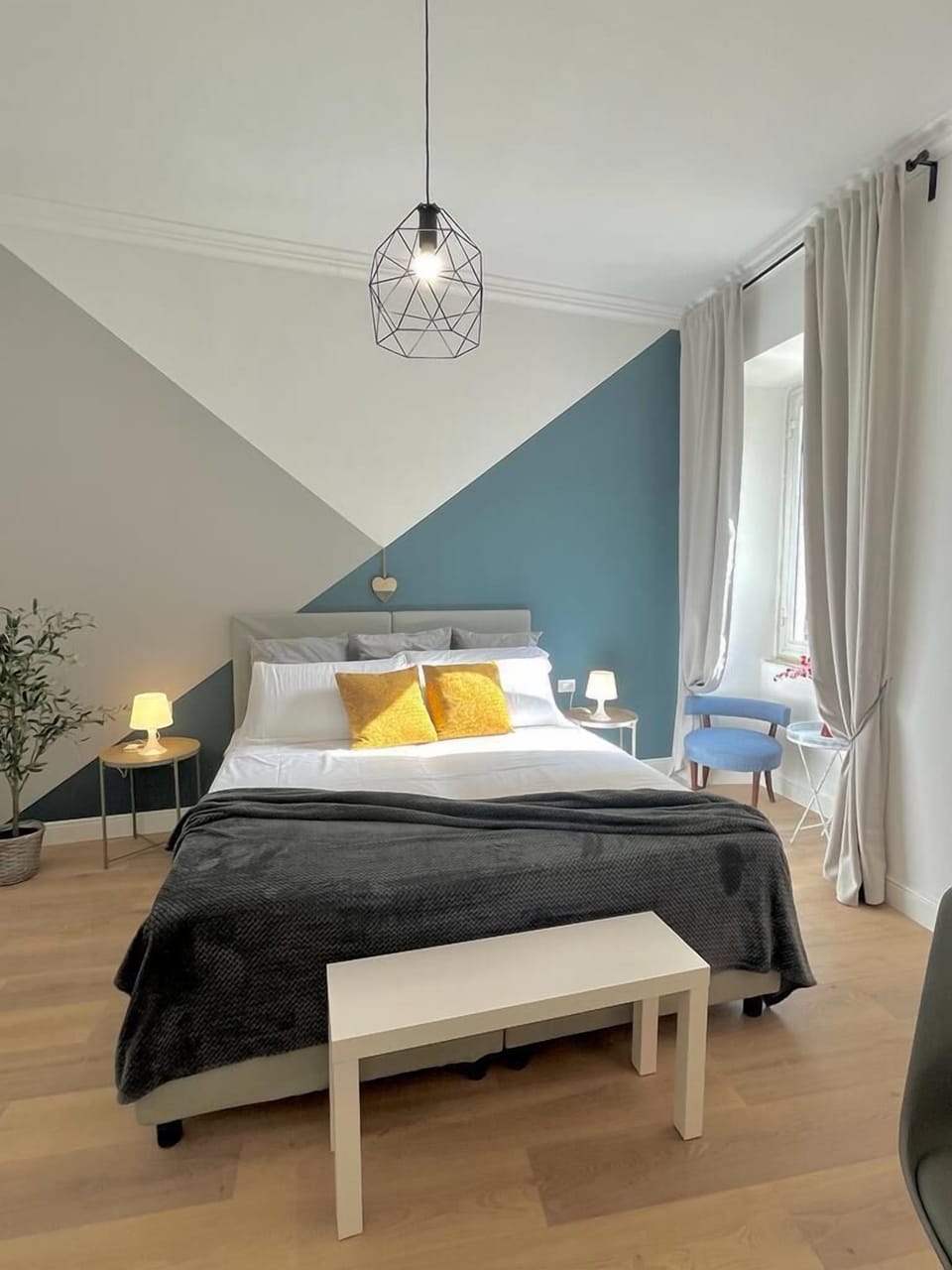 Family Apartment | Down comforters, desk, laptop workspace, blackout drapes