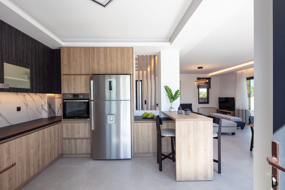 The open plan kitchen-dining area. 