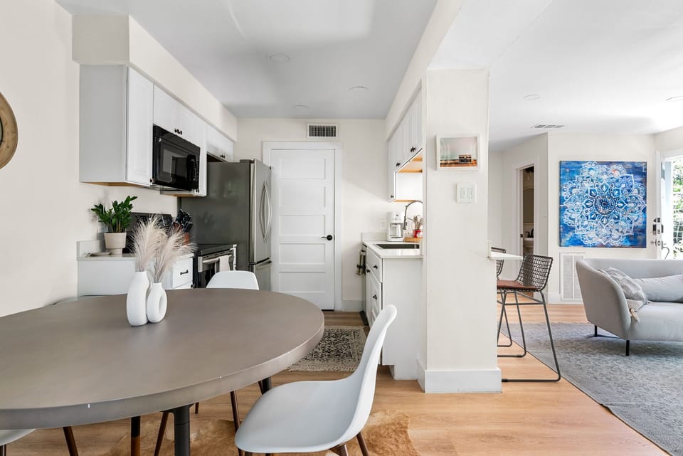 In a kitchen with white cabinets, the countertop becomes a focal point, enhancing the overall design.