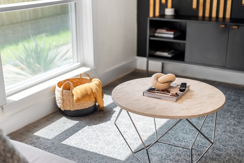 The center table in your living room can serve as a focal point for the space, whether it's a statement piece or a more subtle addition.