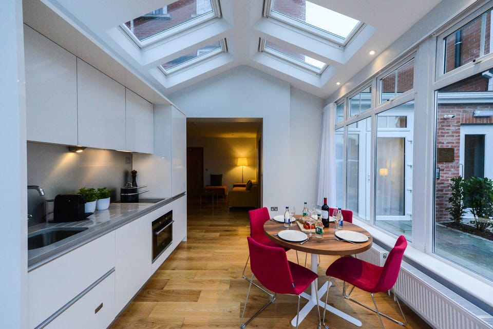 Two Bedroom Apartment | Private kitchen | Coffee/tea maker, electric kettle, highchair
