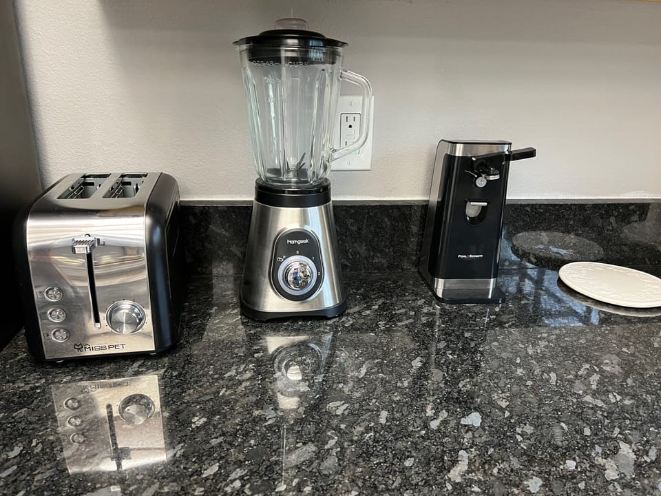 A large variety of dishes, glasses, cookware, bakeware and small appliances. 