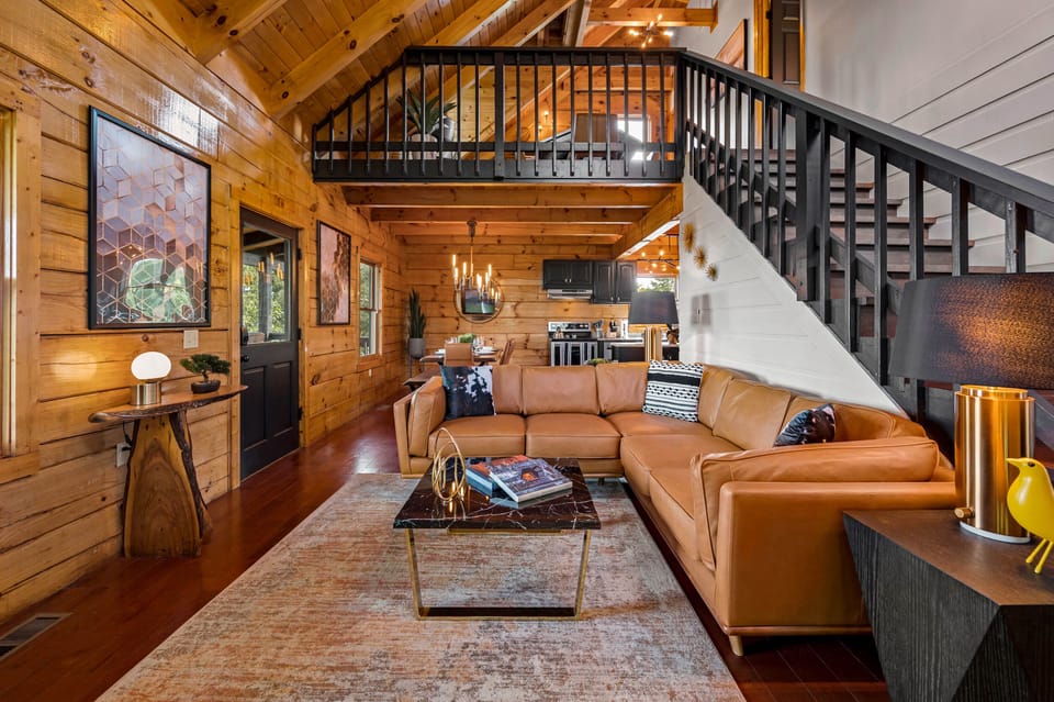 Modern design meets cozy cabin vibes, creating a space perfect for unwinding.