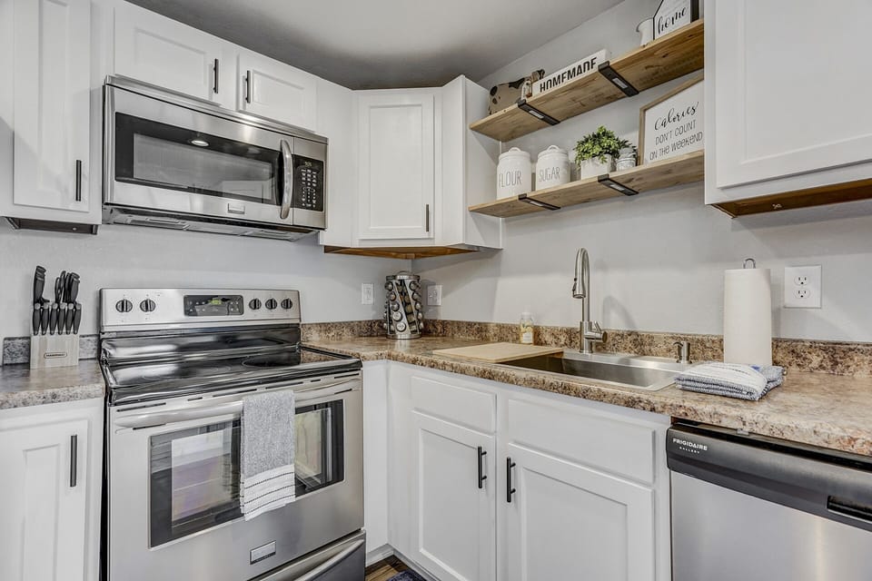 Fully equipped kitchen with plenty of counter space and storage.