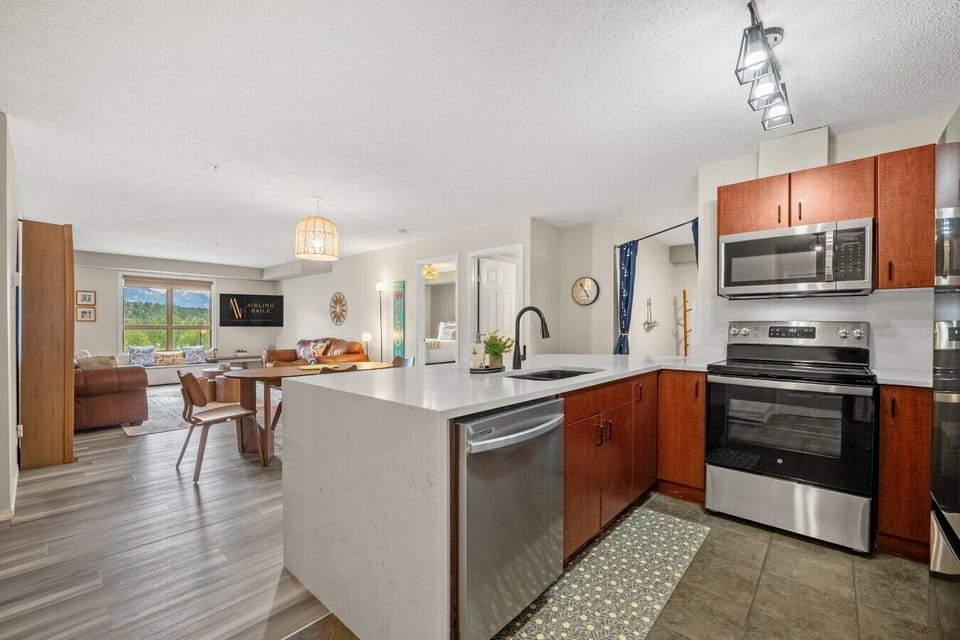 Full kitchen with a drip coffee maker, ground coffee, tea, sugar, and basic condiments (ketchup, mustard & relish.)