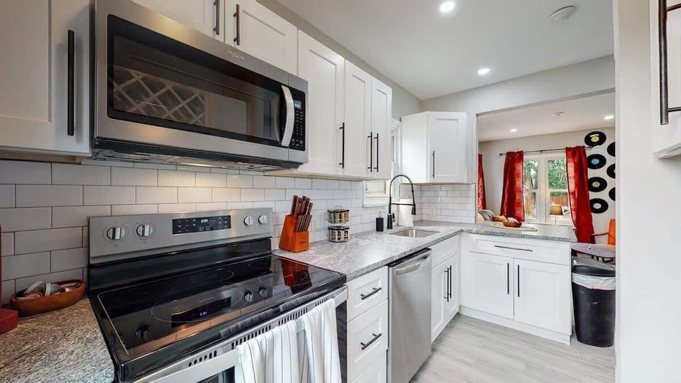 Modern & Fully Equipped Kitchen – Stocked with essential cookware, appliances, and utensils for effortless meal preparation.