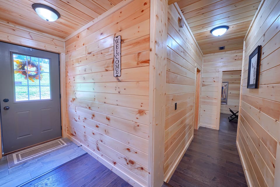 Door to Back Deck on left, Bedroom Wing Hallway on right