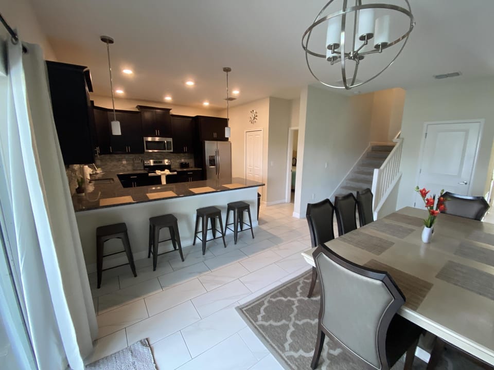 Stylish breakfast bar with seating for casual dining.