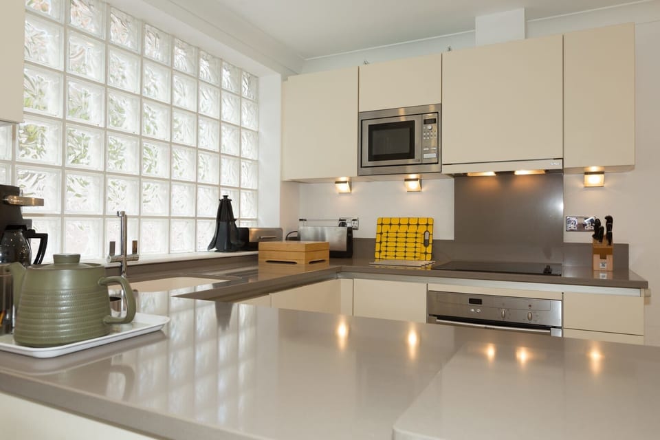 Fridge, dishwasher, electric kettle, cookware/dishes/utensils