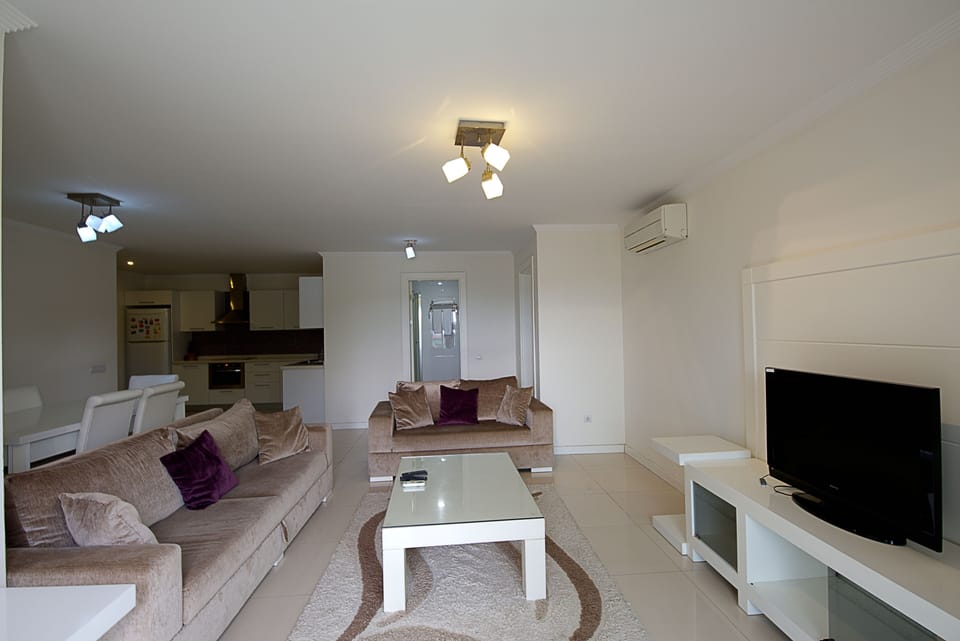 Apartment, 1 Bedroom, Garden View | In-room safe, laptop workspace, iron/ironing board, cribs (free)