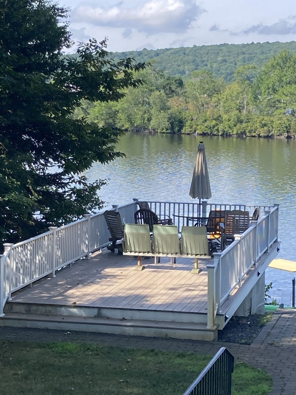 Large sunny deck with plenty of seating