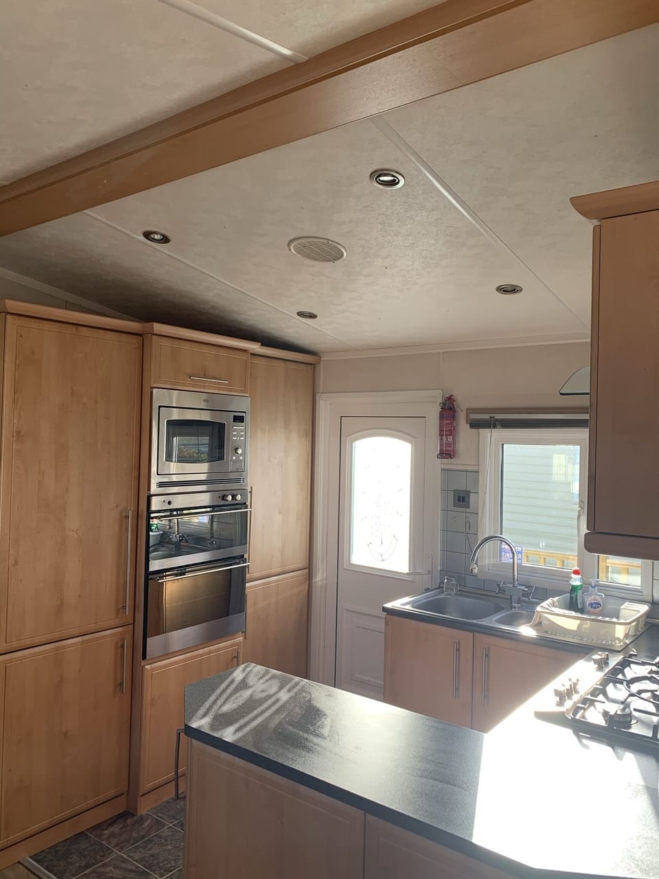 Cabin | Private kitchen | Fridge, microwave, oven, stovetop