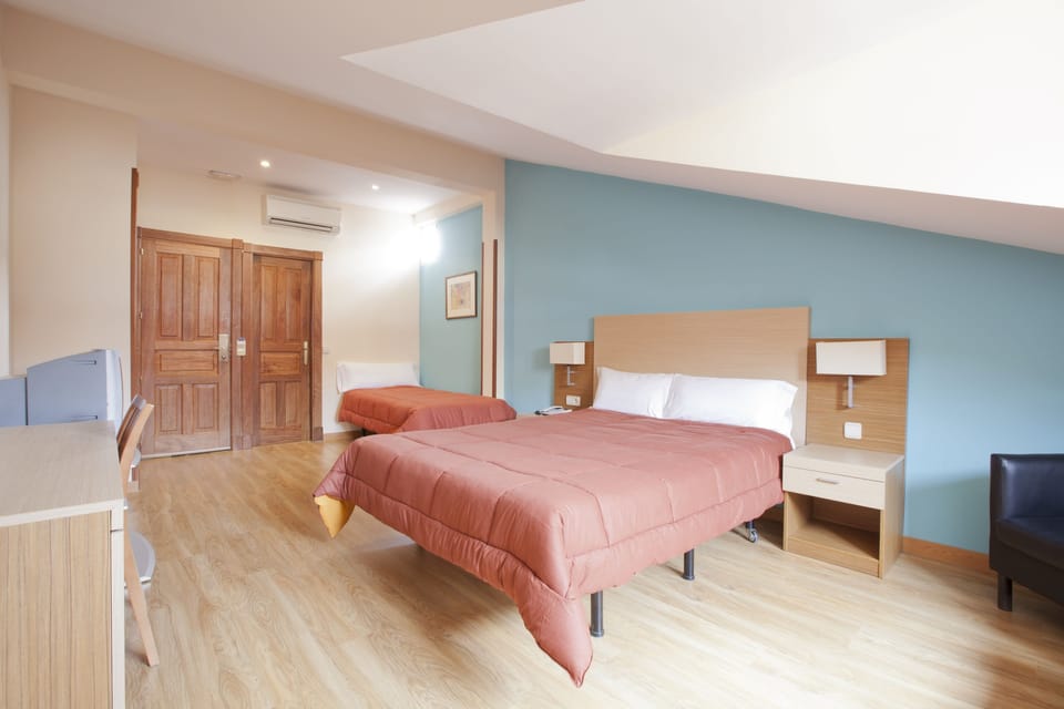Premium bedding, down comforters, in-room safe, desk