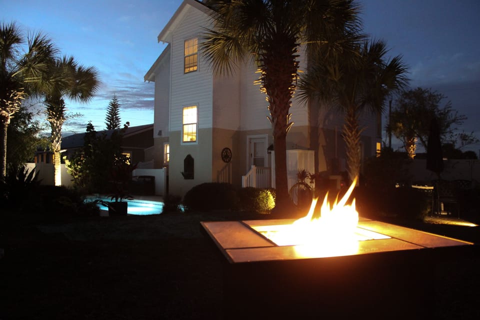 Fire table with Adirondack chairs