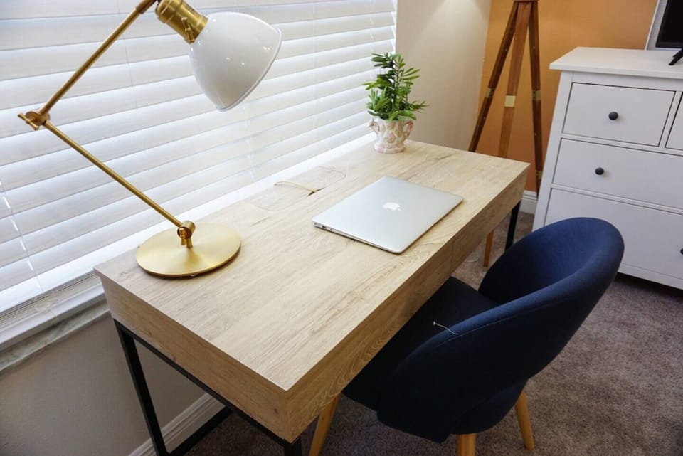 Bedroom 4 Upstairs: We're all about the work space, so we've created a space for you to get it on.