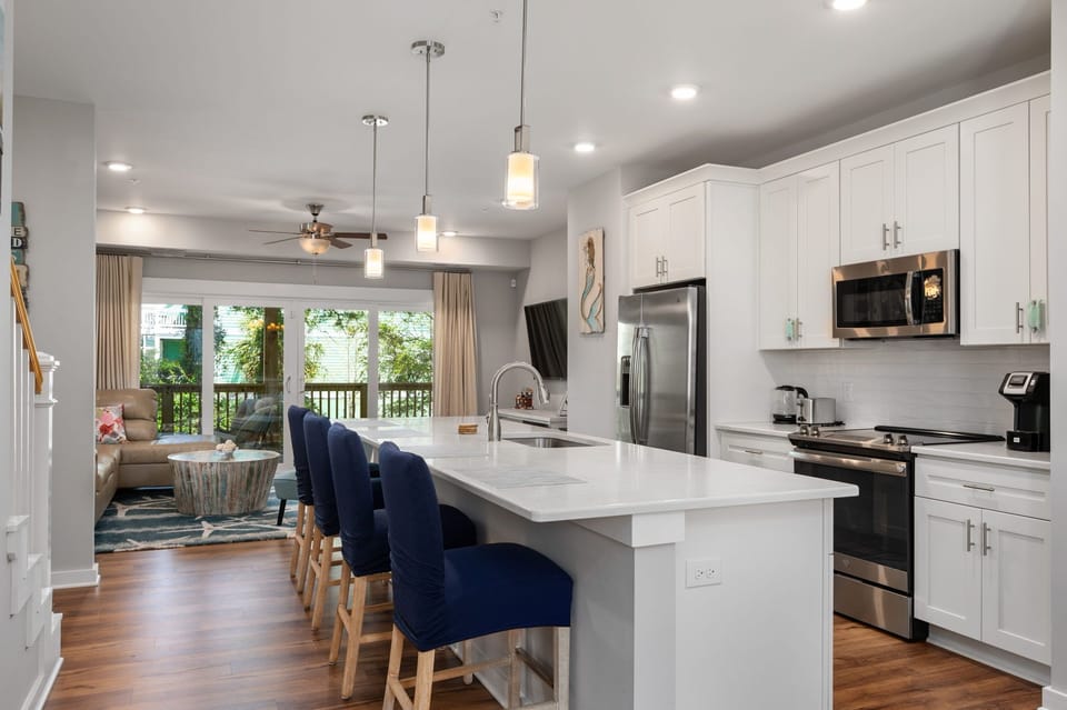 Kitchen Area with Bar Stool Seating on Second Level