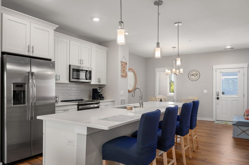 Kitchen with Bar Seating on Second Level