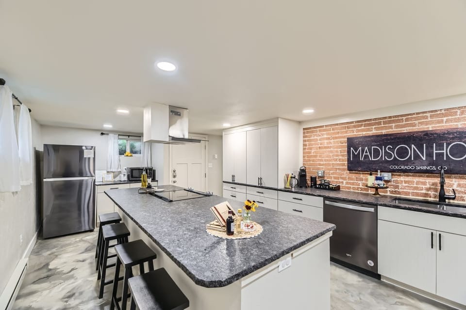 Fully stocked kitchen, stovetop, oven, dishwasher, full size refridgerator