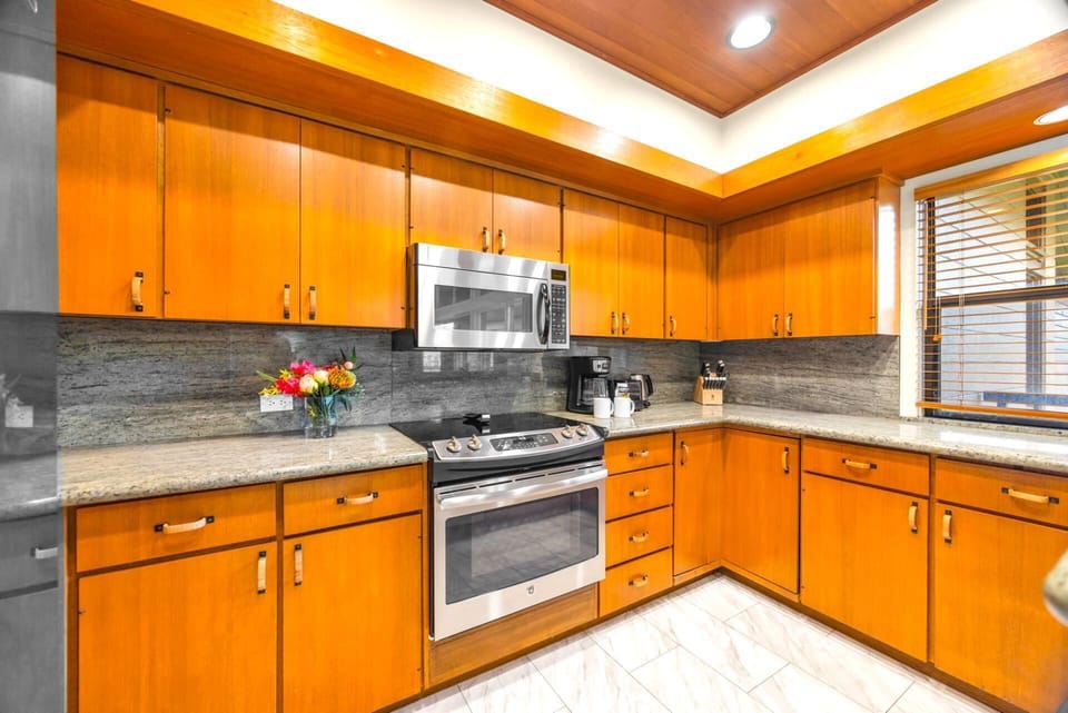 Full-size appliances and granite counters for easy home-style meals.