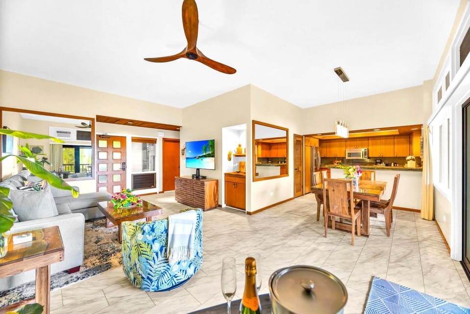 Living space flows easily to kitchen and dining—perfect for laid-back evenings.