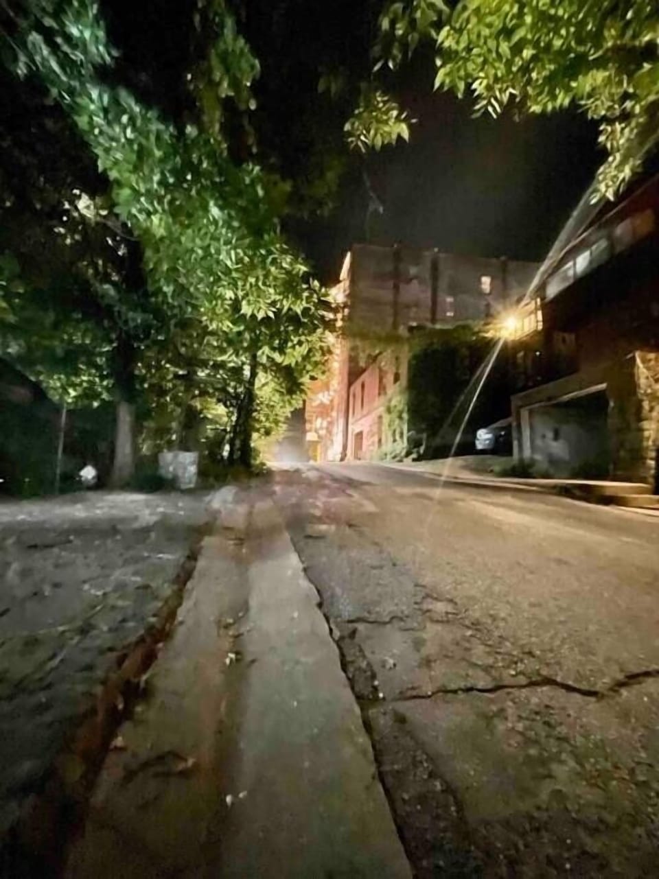 Picture of the street at night! The New Orleans hotel is on the right and there's a very cool open b