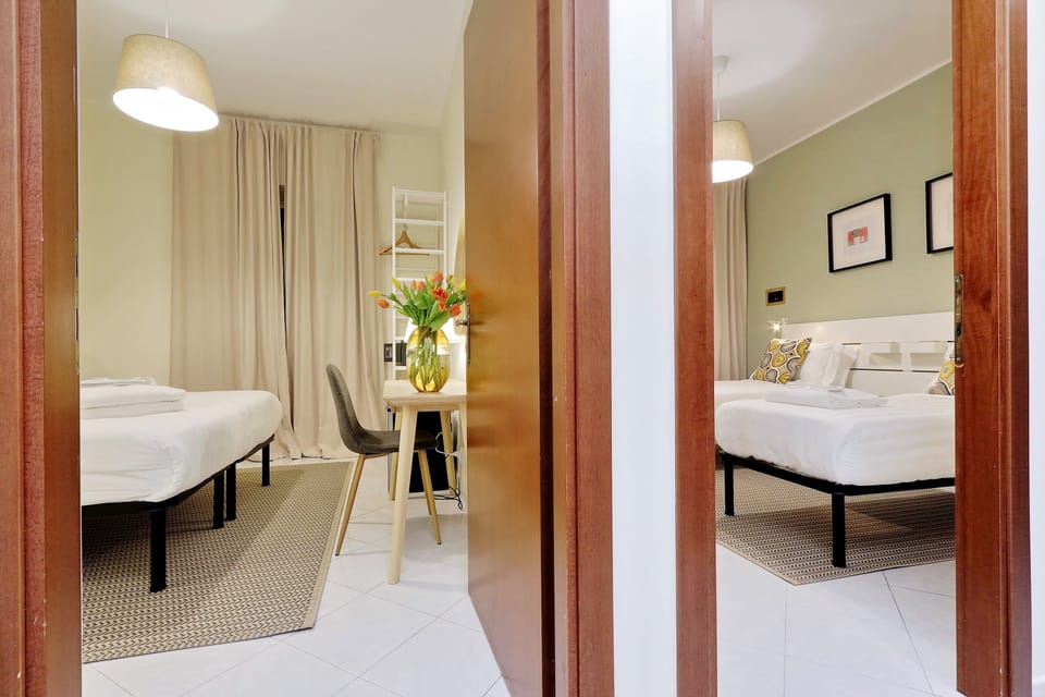 Family Suite | In-room safe, desk, blackout drapes, iron/ironing board
