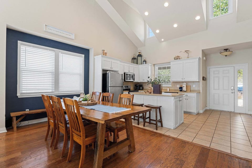This home has a family dining table where everyone can gather for meals and quality time together!