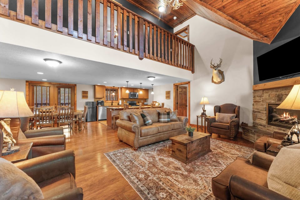 The great room has vaulted ceilings and is open to the living and dining rooms!