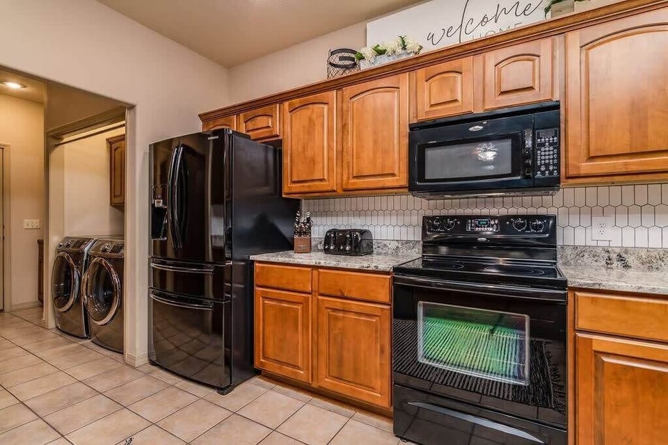 Upgraded appliances and stocked cabinets will make this kitchen feel like home!