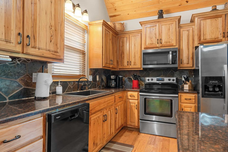 The kitchen is stocked with everything you could need for your stay