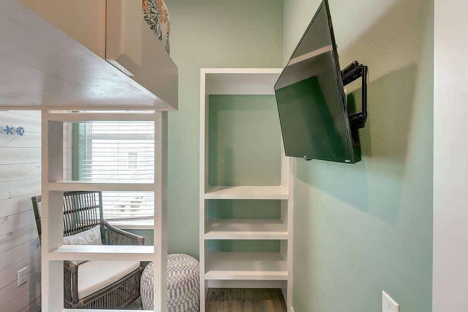 Bunk room with tv