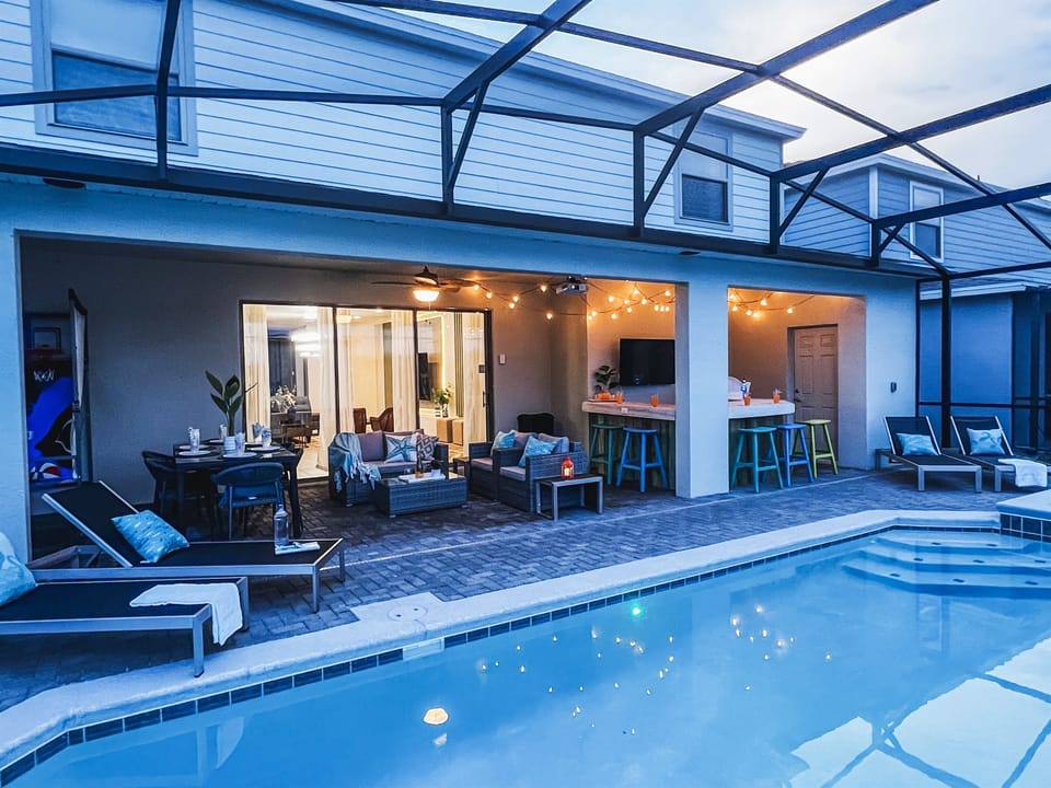 Enjoy The Pool Area At Night Also