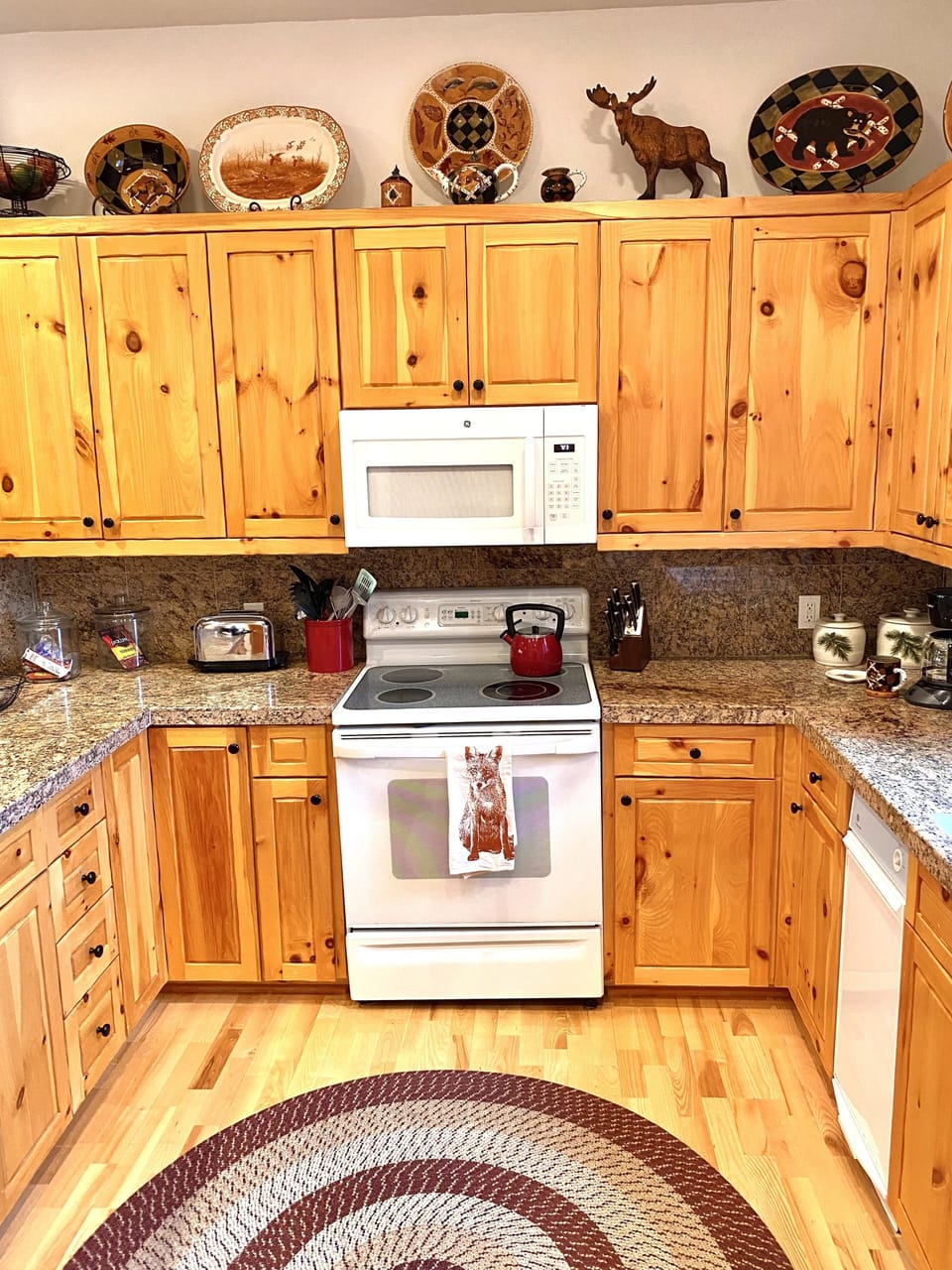 Spacious kitchen stocked with kitchen essentials including crockpot & toaster.