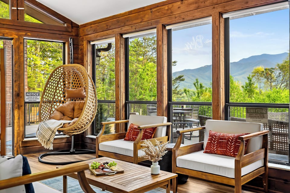 Living room opens up into the light-filled SUNROOM - the perfect spot to read a book, play games, chat or just sit back and enjoy the views.