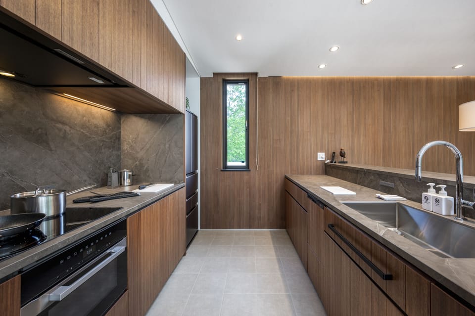 Villa | Private kitchen | Full-size fridge, dishwasher, highchair, cookware/dishes/utensils