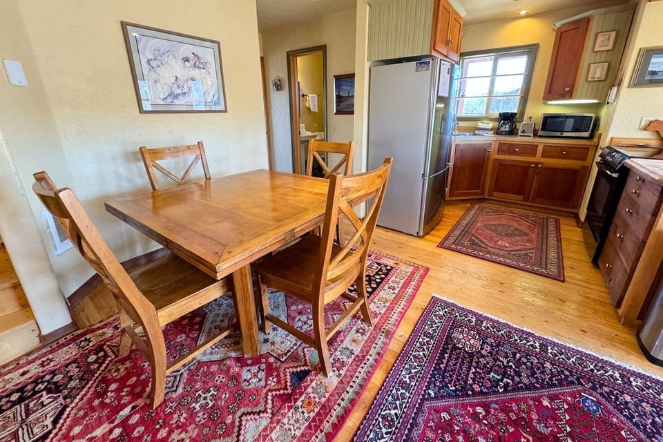 Gather around the dining table for conversation, food, and fun.