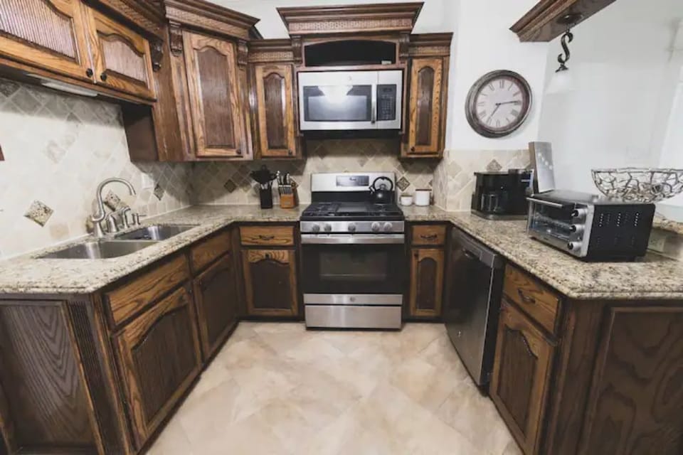 Custom kitchen fully stocked with all the utensils you need. 