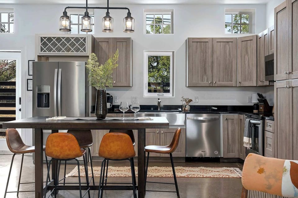 Views from living room to kitchen.