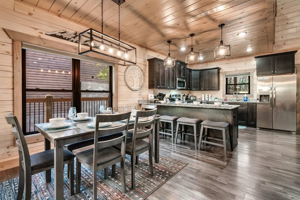 Dining Area: Gather around the stylish table for memorable meals and mountain views!