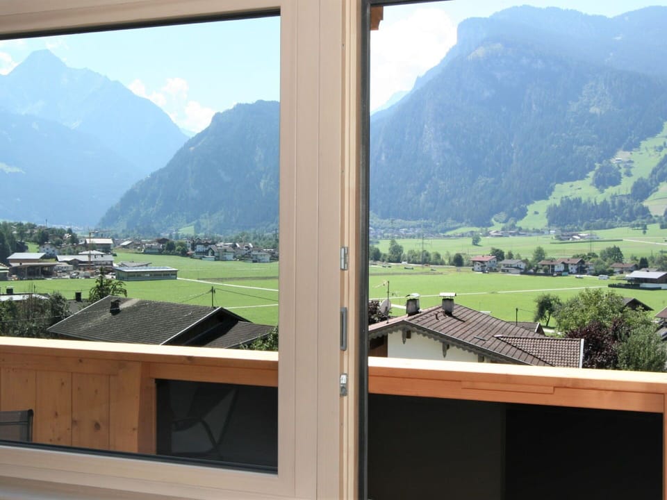 Sky, Cloud, Daytime, Window, Property, Building, Mountain, Ecoregion, Plant, Shade