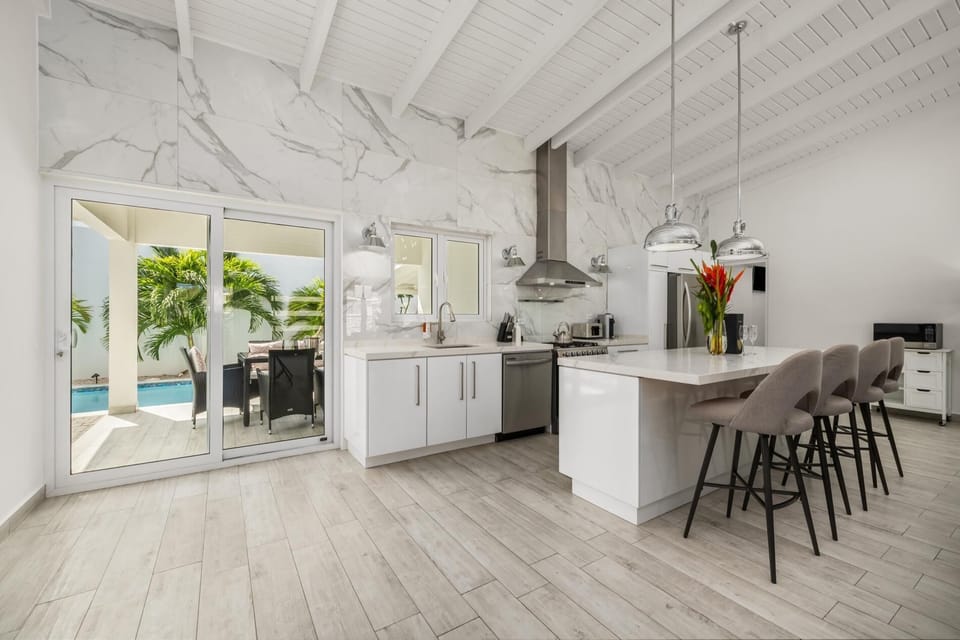You'll never want to leave your beautiful island vacation home with its modern décor, stainless steel appliances, and kitchen island!