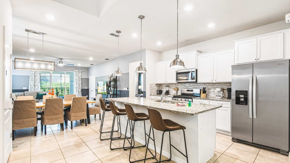 Elegant, spacious kitchen with modern amenities and a stylish breakfast bar—ideal for entertaining and everyday living.