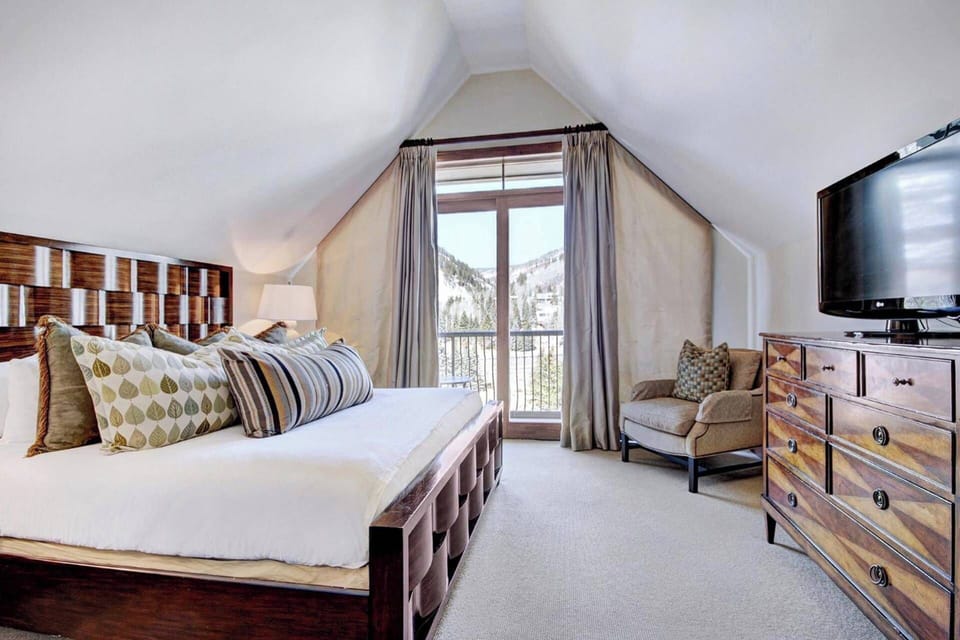 Guest bedroom features a king bed.
