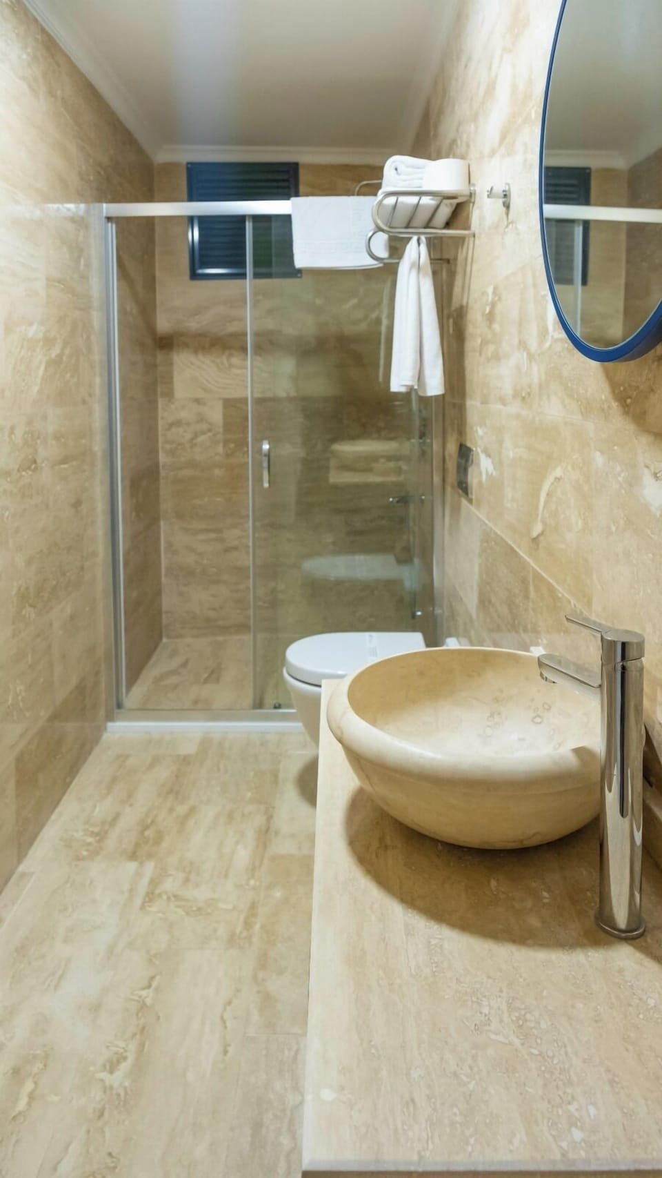 Shower, rainfall showerhead, hair dryer, towels