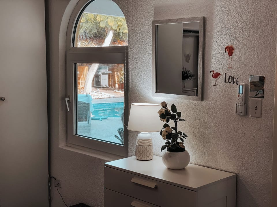 Flamingo Room - Master Bedroom - view of the private pool
