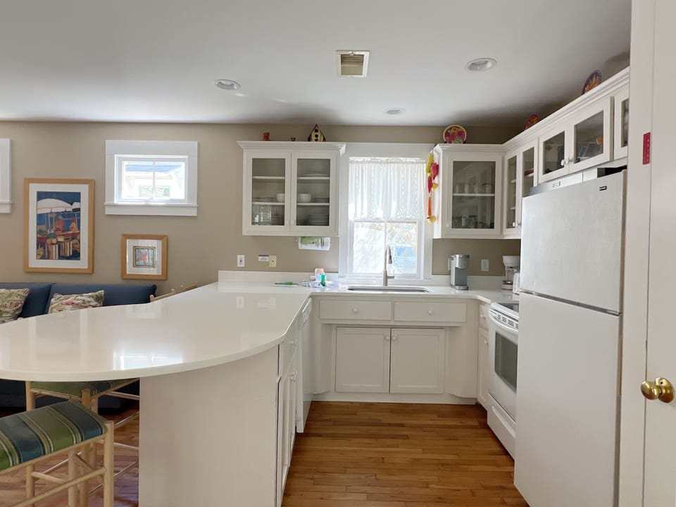 KITCHEN ALTERNATE VIEW FEATURING NATURAL LIGHT