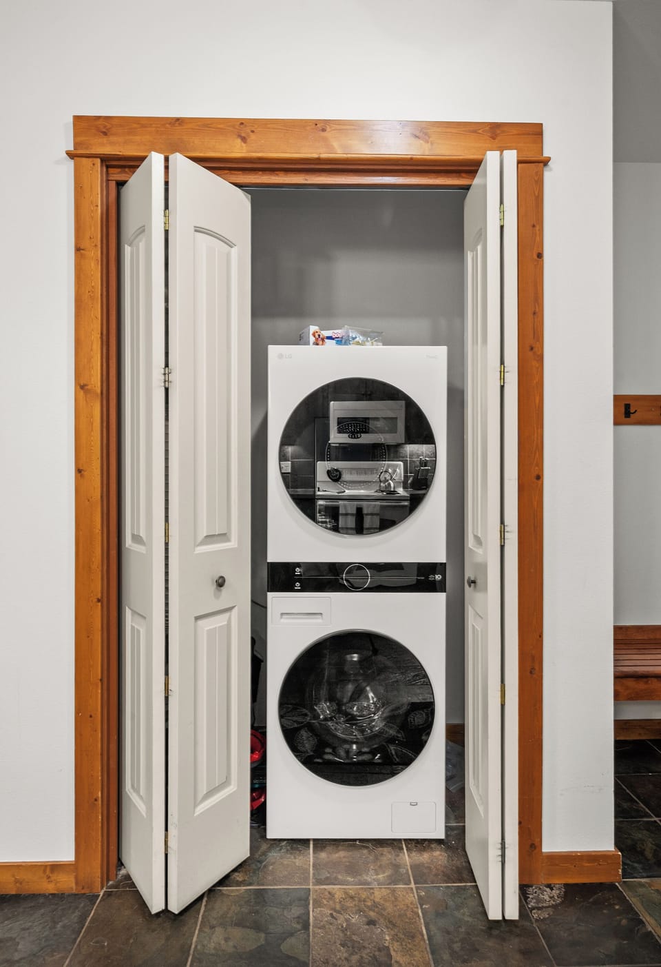 Convenient in-unit washer/dryer tucked neatly into a hallway closet