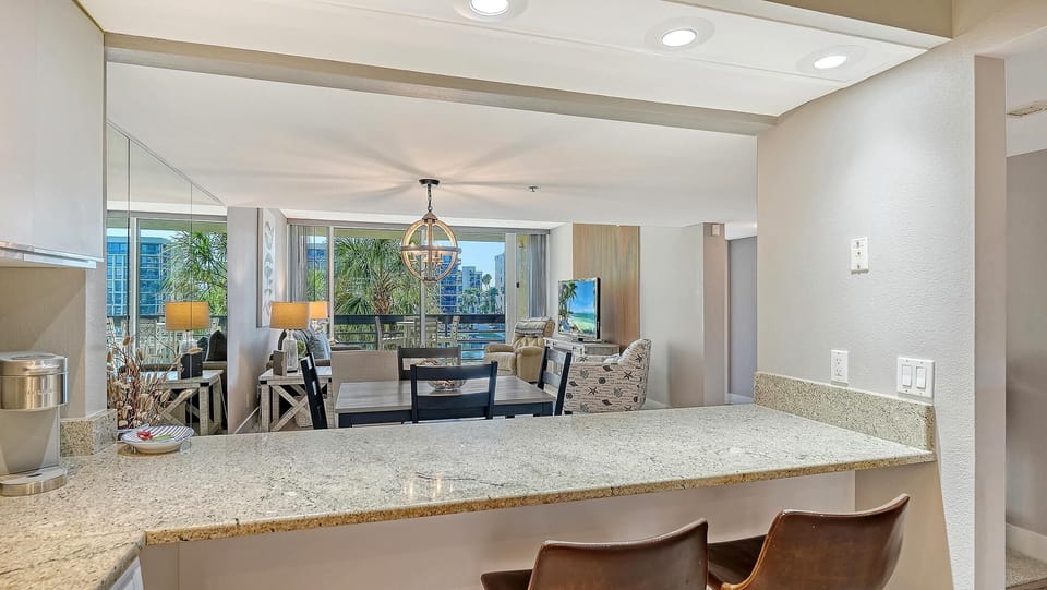 Bright, open kitchen and dining area with garden views